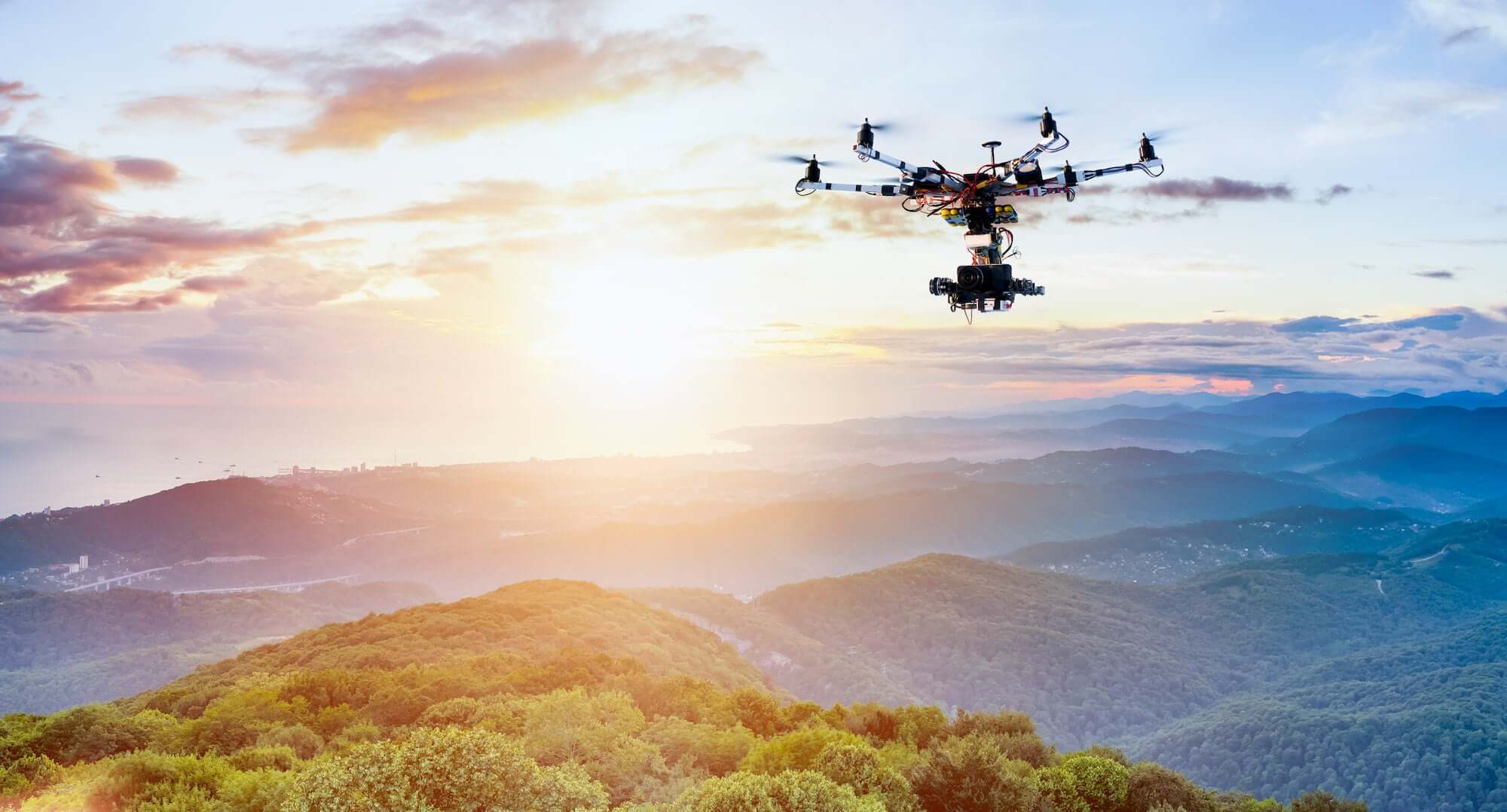 A drone flying over a landscape